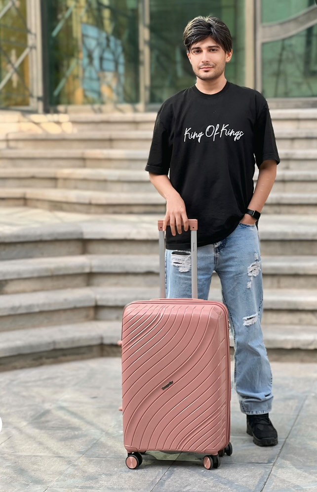 Abbas Damerchi standing outside